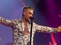 Robbie Williams feels ‘strange’ after breaking Elvis Presley’s chart record