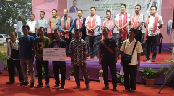 Cabinet minister James Sangma distributes cheques under PES pilot project