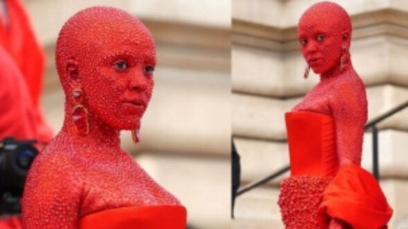 Doja Cat covered in red paint & 30,000 crystals for Paris Fashion Week