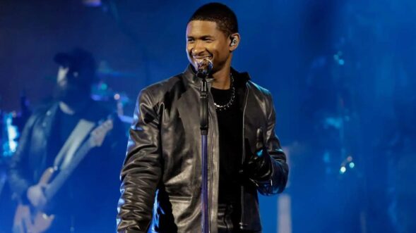 Usher has a ball with his kids in new dance video